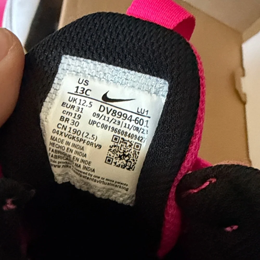 Nike kids pink and Black Sneakers